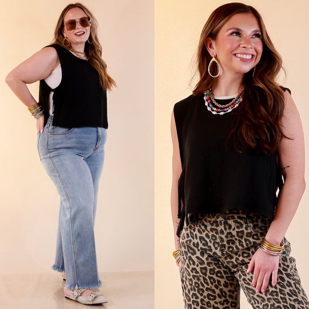 Models are wearing Sleeveless Linen Tank Top with Side Tie Detail in Black with Jeans against a beige backdrop. 