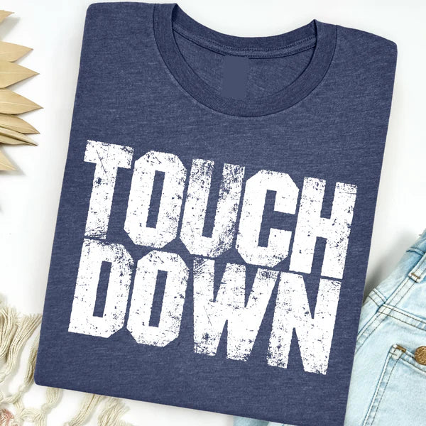 Navy blue t-shirt with 'TOUCHDOWN' text on a light background