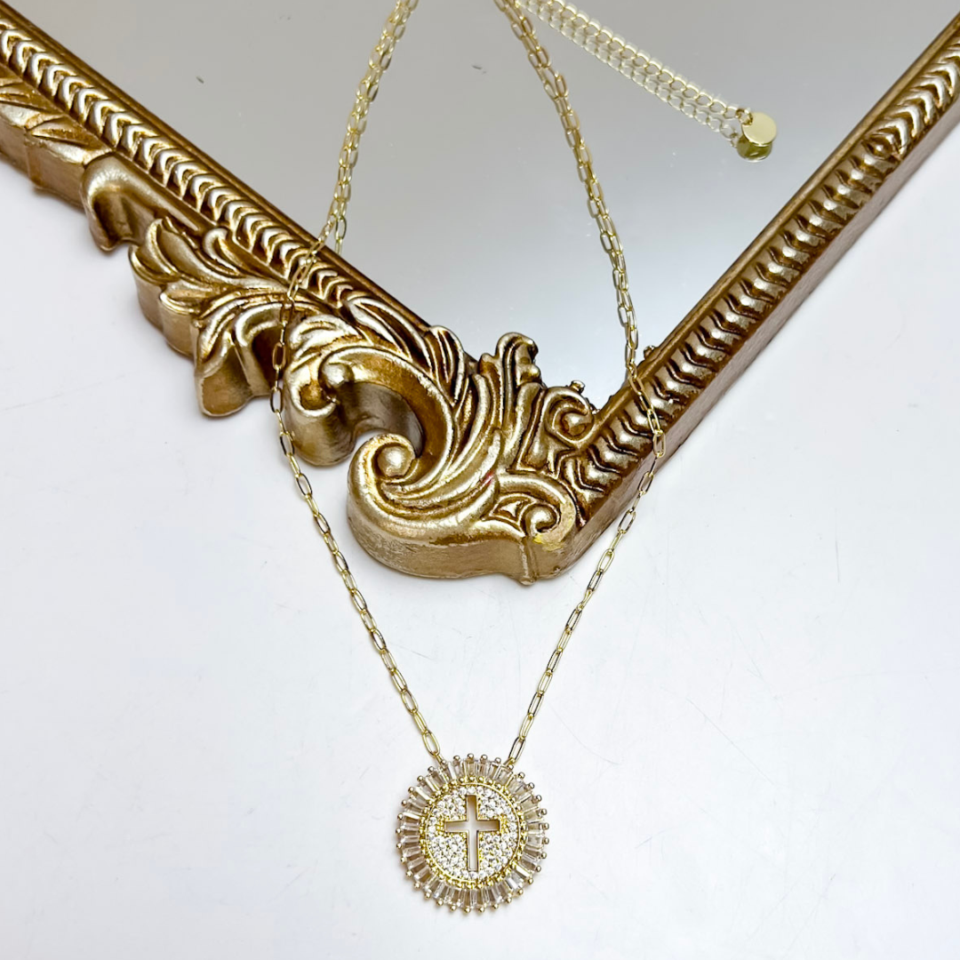 Shop the Treasure Jewels Grace Cross Medallion Necklace in Gold featuring a crystal halo and polished cross pendant for timeless faith-inspired style.
