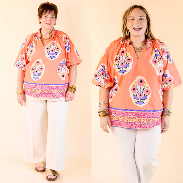 Soft, breezy, and blooming with charm—Twirling Tulips pairs coral and purple florals with a flattering A-line fit and collared V-neck. Sizes XL through 2XL. 