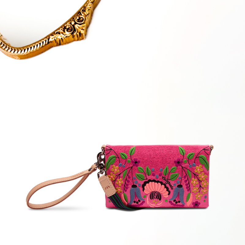 Pink embroidered clutch with floral design on a white background