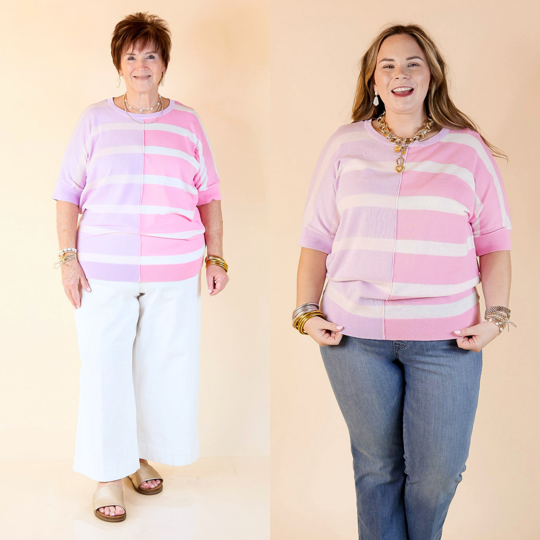 This top has short sleeves, a striped pattern in pink and purple hues, and a lightweight knit fabric. Available in sizes small to 3XL.