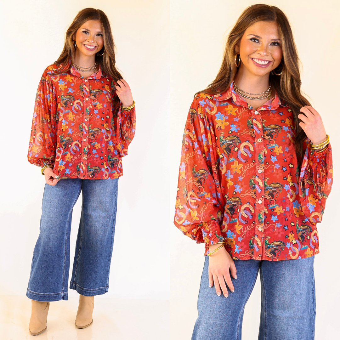 Woman wearing a mesh top with horse shoe print and jeans on a white background