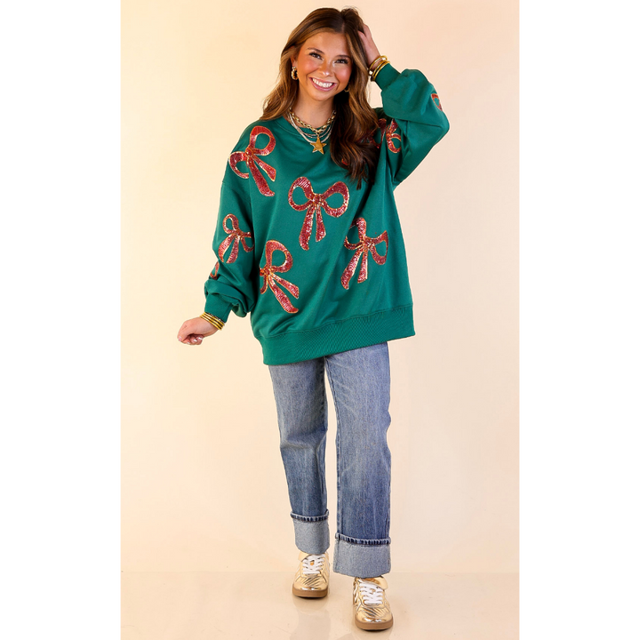 Wrapped in Style Crewneck Sweatshirt with Sequin Red Bows in Dark Green