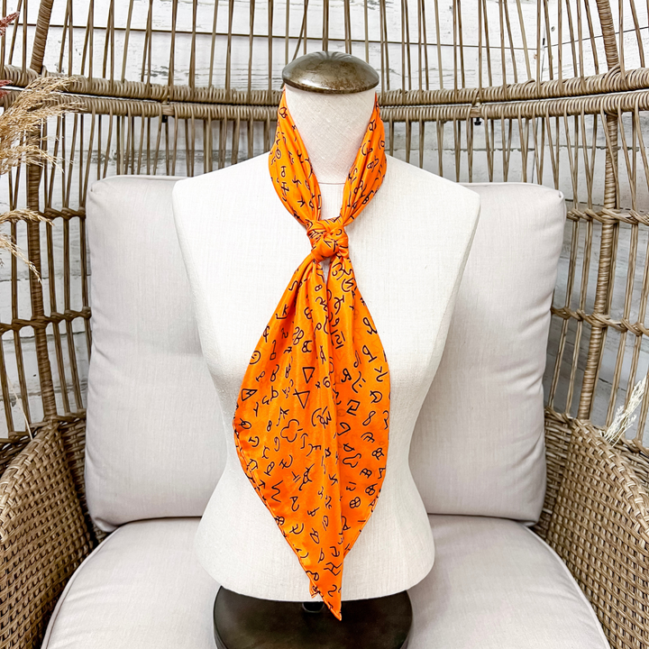 Wyoming Traders | Branded Print Silk Wild Rag Scarf in Orange