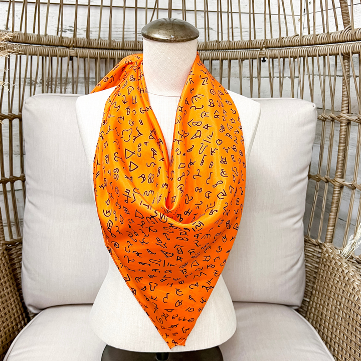 Wyoming Traders | Branded Print Silk Wild Rag Scarf in Orange