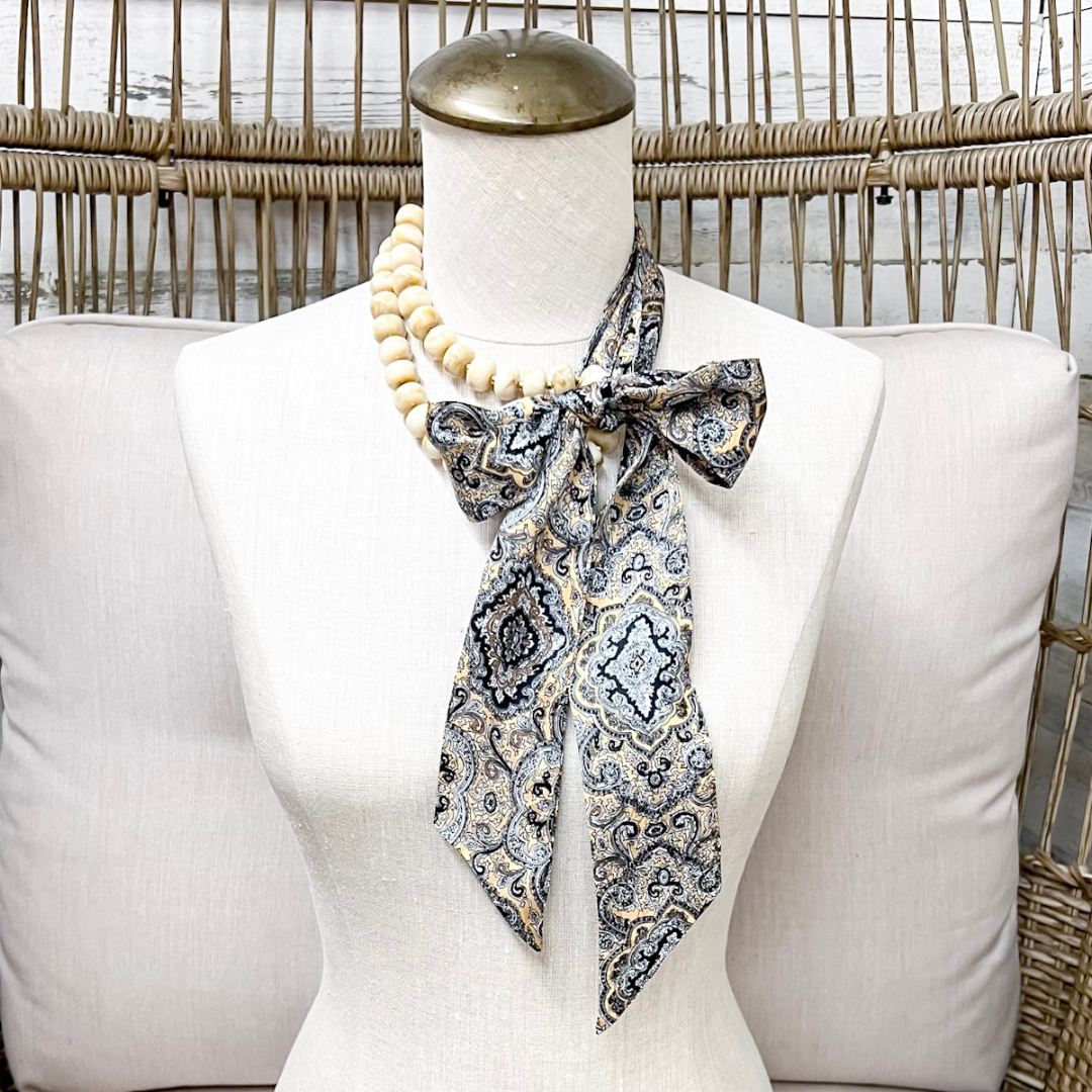 Wyoming Traders | Frontier Paisley Print Silk Twilly Scarf in Tan and Black