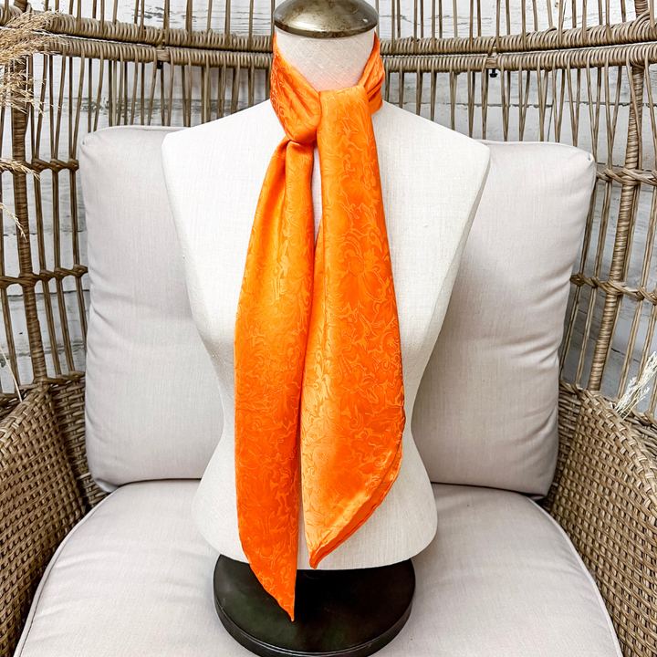 Wyoming Traders | Jacquard Print Silk Wild Rag Scarf in Orange