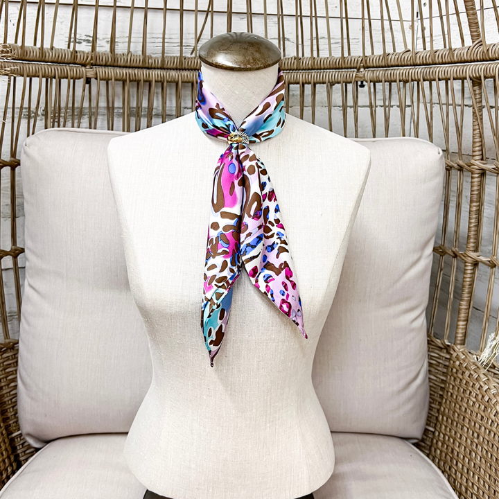 Wyoming Traders | Mini Bamboozled Animal Print Charmeuse Silk Wild Rag Scarf in Pink and Blue