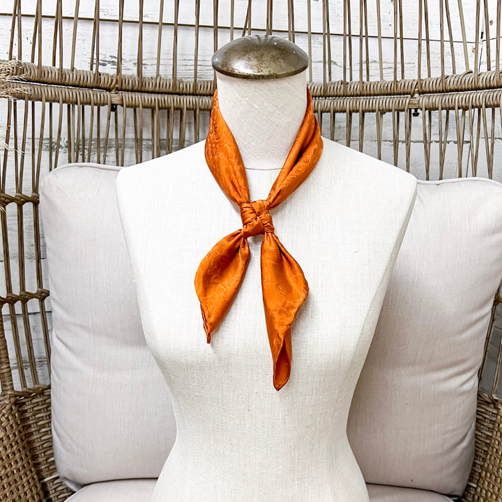 Wyoming Traders | Mini Jacquard Print Silk Wild Rag Scarf in Copper Orange