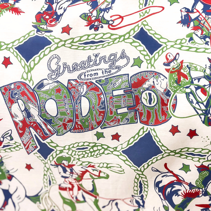 XOXO Art & Co | Greetings from the Rodeo Print Shorty Wild Rag Scarf in Ivory, Green, Red and Blue
