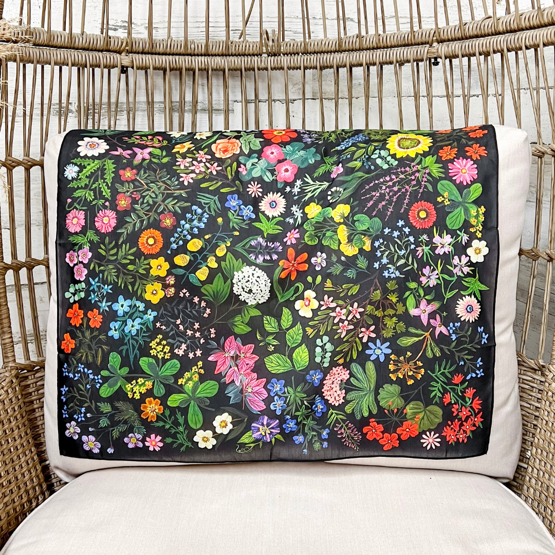 XOXO Art &amp; Co Pressed Flowers Print shorty wild rag scarf in black with colorful pink, blue, yellow, orange, purple, and green floral details.