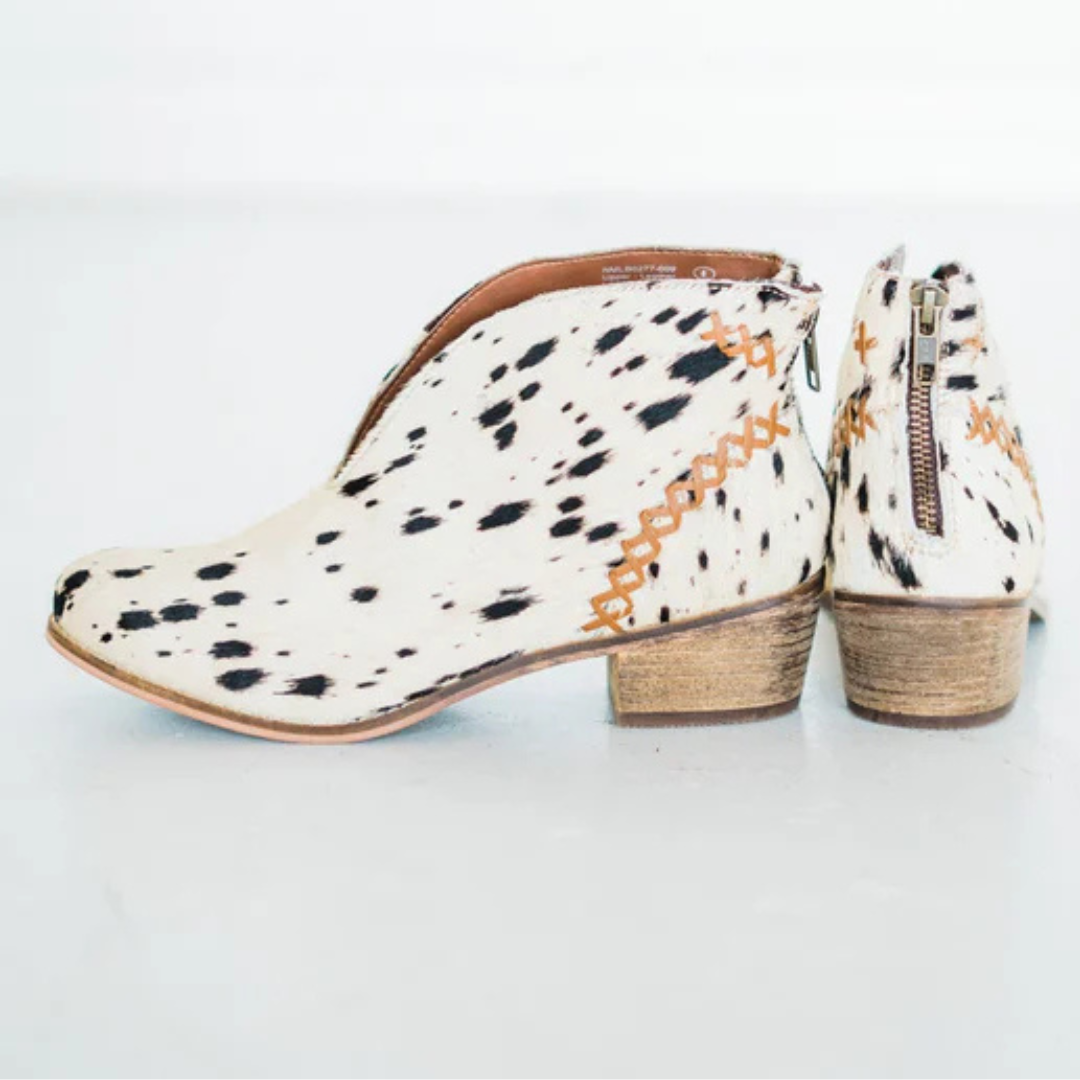 Online Exclusive | All Roads Bootie in Black and White Cow Print