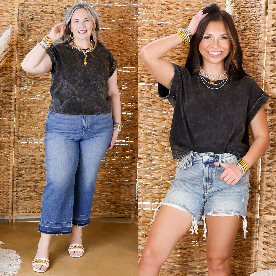 This slightly cropped tee features a classic crew neck and short sleeves, making it the perfect go-to for warm-weather outfits. In sizes small through large. 