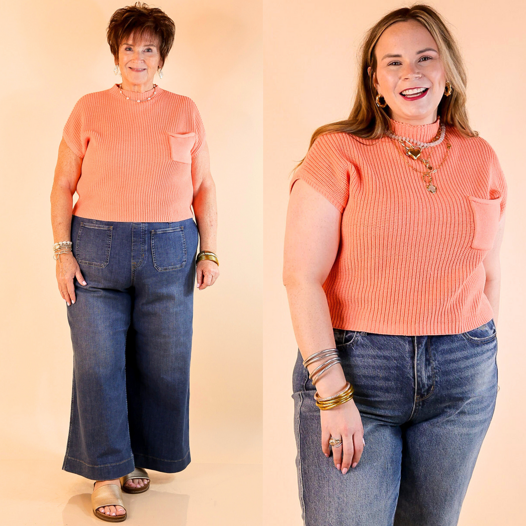 Designed with a chic mock neck, short sleeves, and a stylish front pocket, this versatile sweater top is perfect for effortless everyday wear.