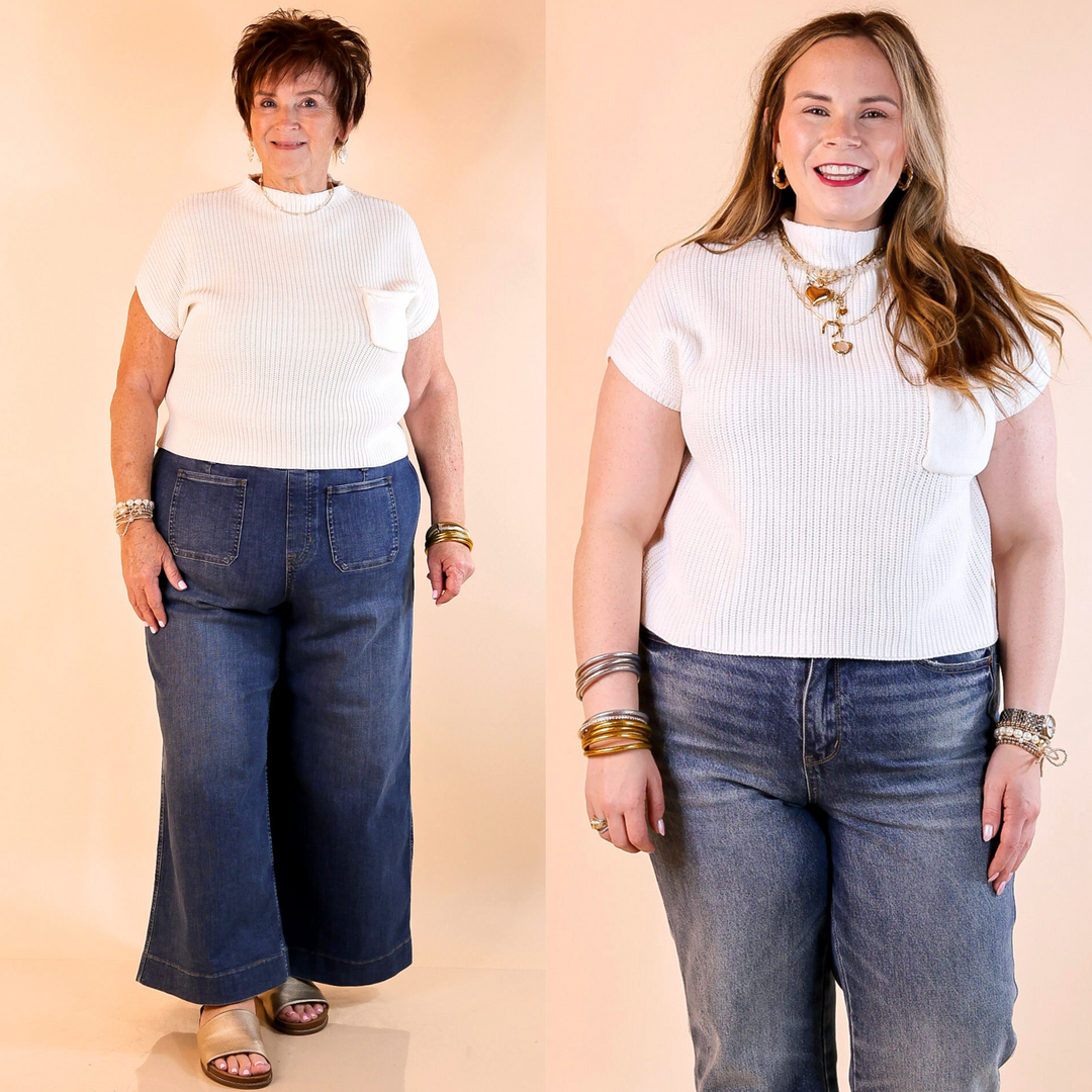 Designed with a chic mock neck, short sleeves, and a stylish front pocket, this versatile sweater top is perfect for effortless everyday wear.