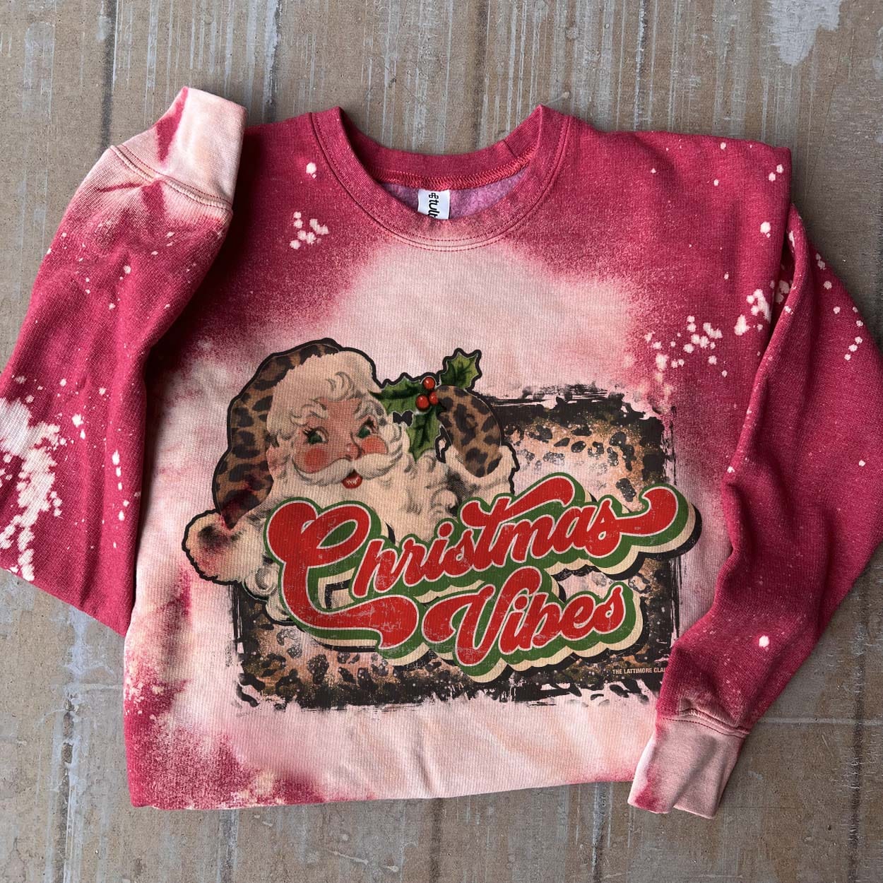 Online Exclusive | Christmas Vibes Long Sleeve Bleached Splatter Graphic Sweatshirt in Red - Giddy Up Glamour Boutique