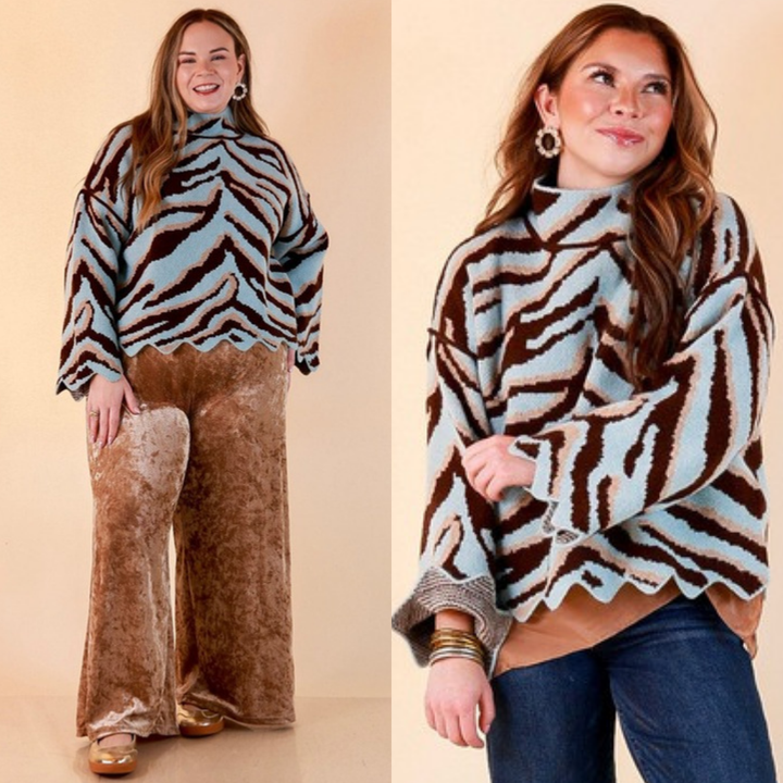 Two images of a woman wearing the Color Me Wild Zebra Print Mock Neck Bell Sleeve Sweater with Scalloped Hem in Light Blue on a beige background