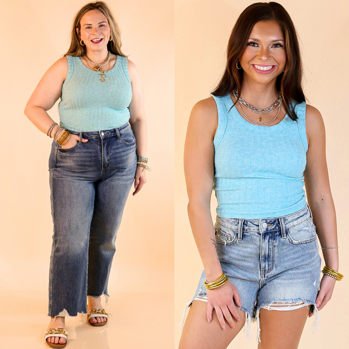 This top features a trendy ribbed texture, sleeveless design, and cropped length. Available in sizes small through large.