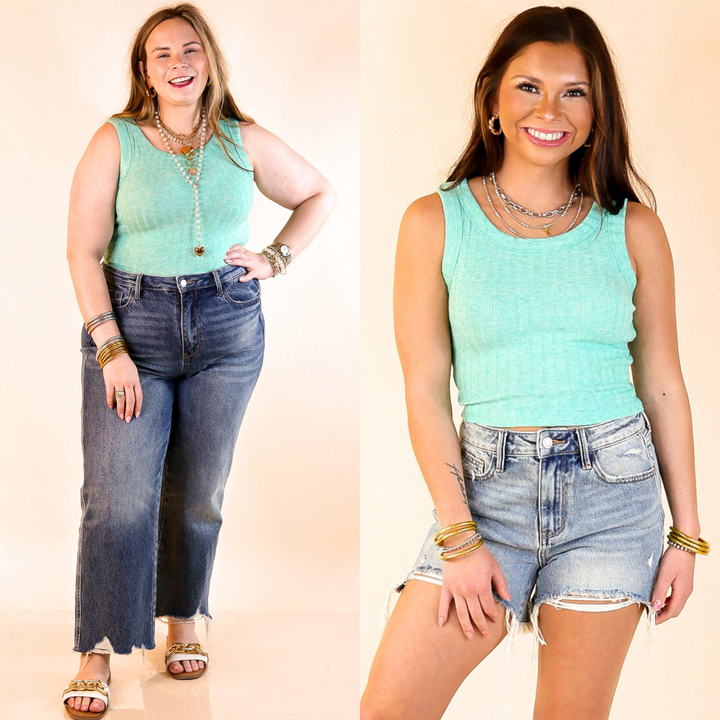 This top features a trendy ribbed texture, sleeveless design, and cropped length. Available in sizes small through large.