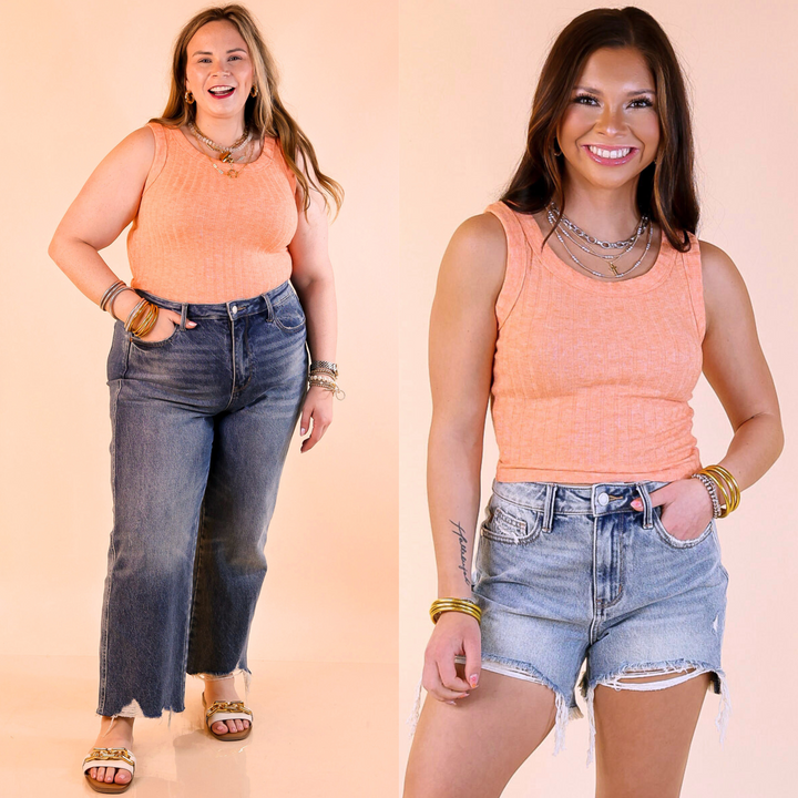 This top features a trendy ribbed texture, sleeveless design, and cropped length. Available in sizes small through large.