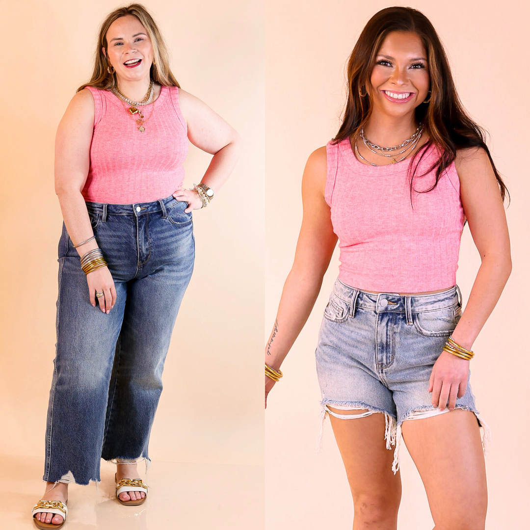 This top features a trendy ribbed texture, sleeveless design, and cropped length. Available in sizes small through large.