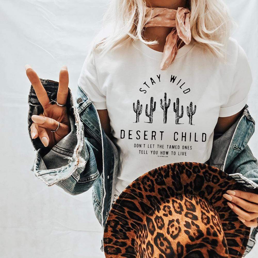 Online Exclusive | Stay Wild Desert Child with Cactus Short Sleeve Graphic Tee in White - Giddy Up Glamour Boutique