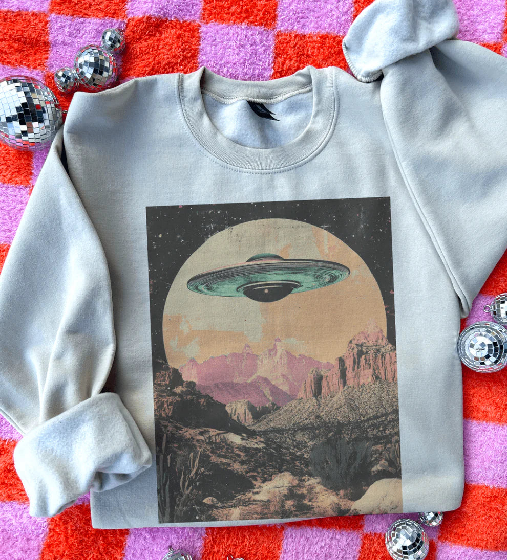 My Ride Is Here graphic tee with UFO & desert landscape design – cream sweatshirt