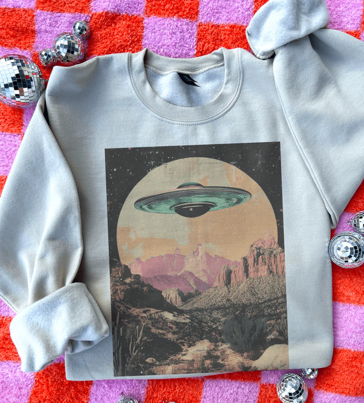 My Ride Is Here graphic tee with UFO & desert landscape design – cream sweatshirt