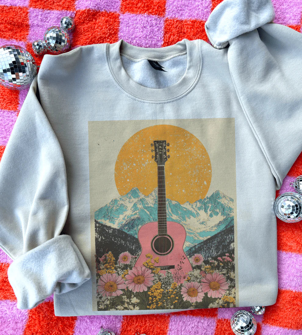 Smoke and Embers graphic tee with pink guitar & mountain sunset design – cream sweatshirt
