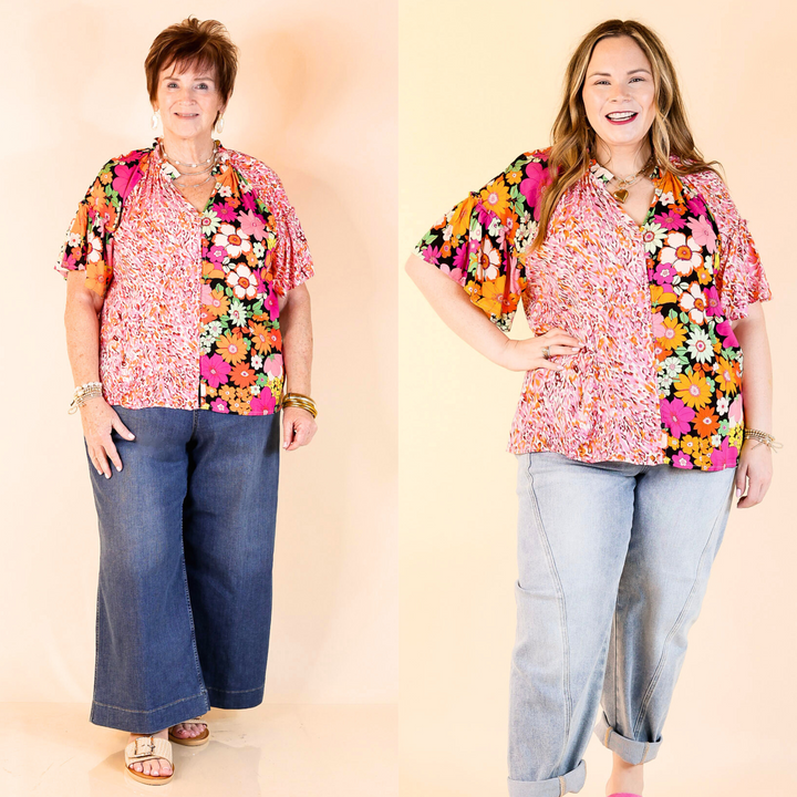 This top features colorful florals, ruffles on the neckline and sleeves, and a keyhole neckline. Available in sizes small through large.