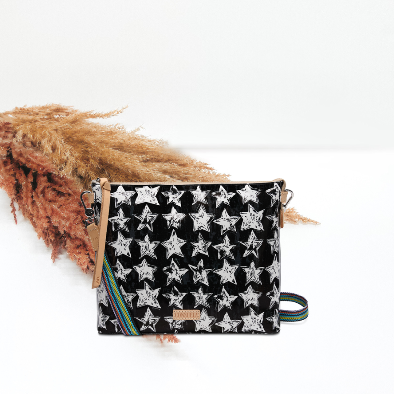 Black pouch with star pattern on a white background