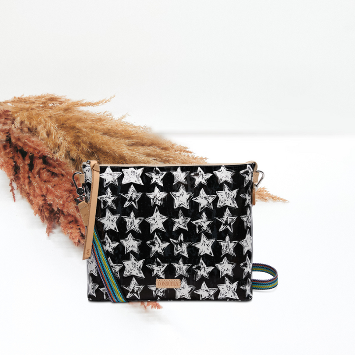 Black pouch with star pattern on a white background