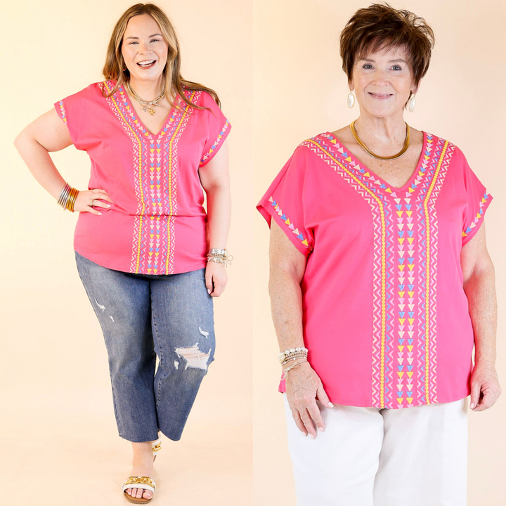 This top includes short sleeves, a v neckline, and colorful embroidery down the front and on the sleeves. Available in sizes small through plus size.