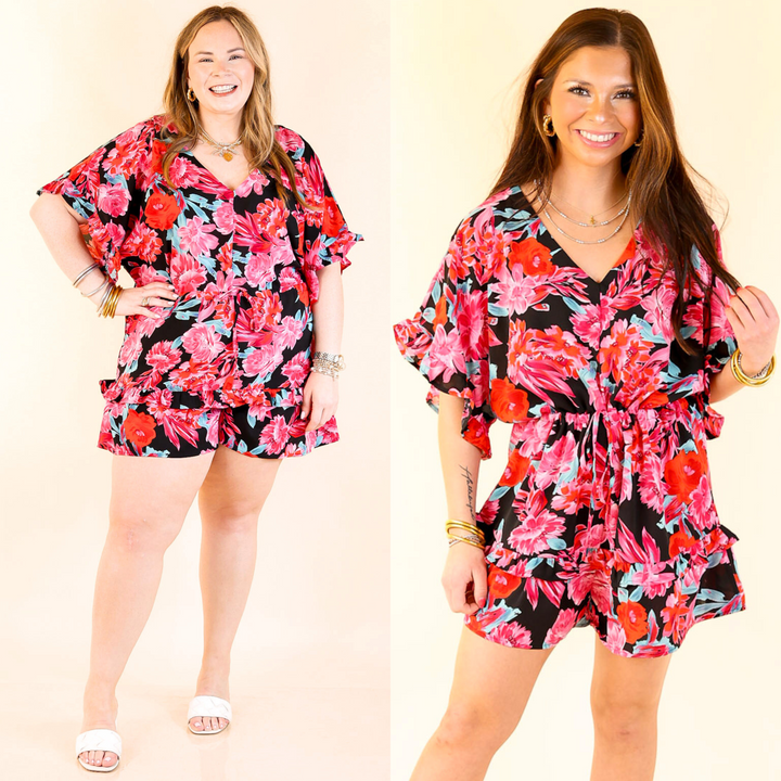 This romper has ruffle trim sleeves, a v neckline with a snap button, a waist tie, ruffle trim around the shorts, and a button keyhole back. Sizes small to plus sizes.