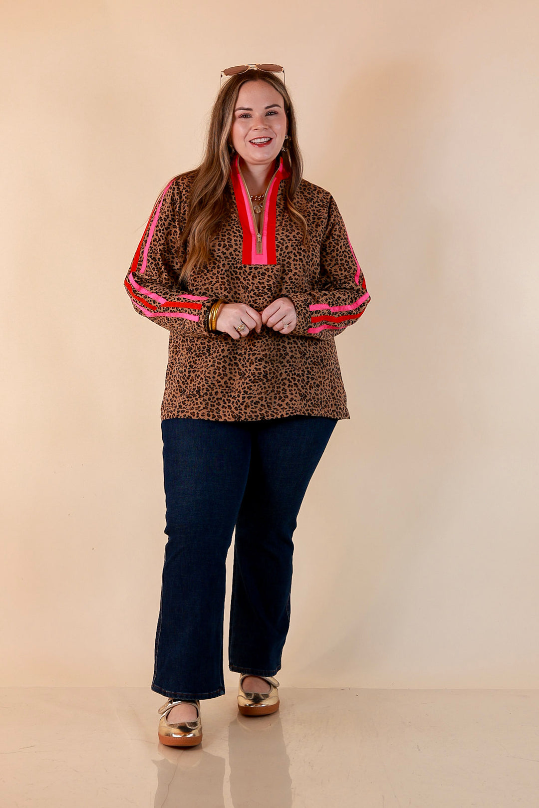 Front Runner Leopard Print Quarter Zip Long Sleeve Pullover Top with Stripe Trim in Tan, Red and Pink
