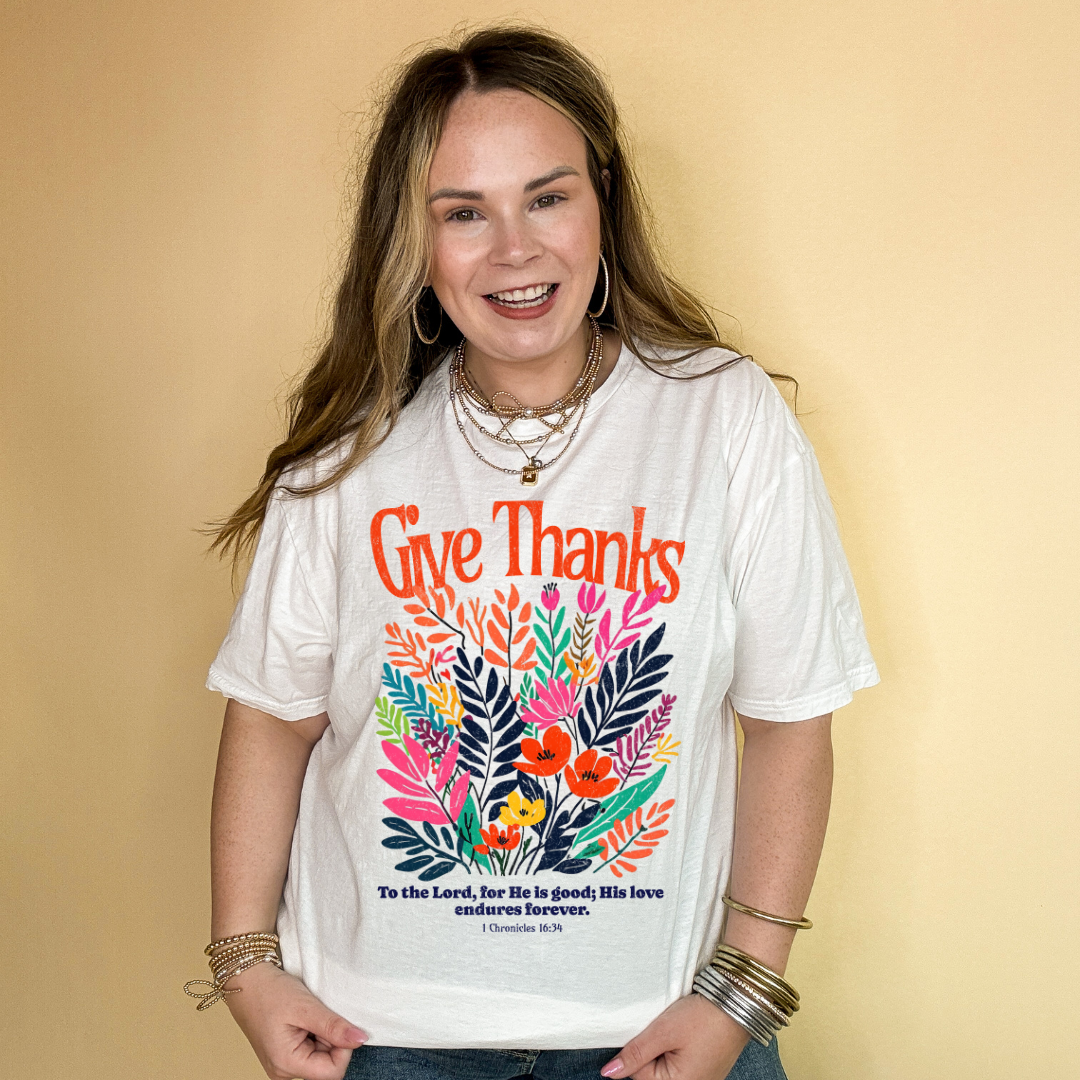 Online Exclusive | 1 Chronicles 16:34 Give Thanks Floral Fusion Graphic Tee in Multiple Color Options