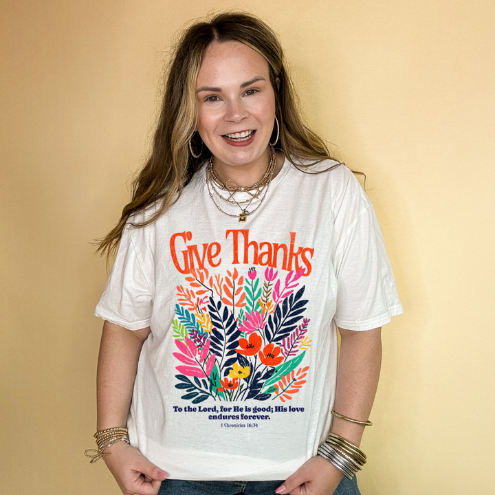 Online Exclusive | 1 Chronicles 16:34 Give Thanks Floral Fusion Graphic Tee in Multiple Color Options