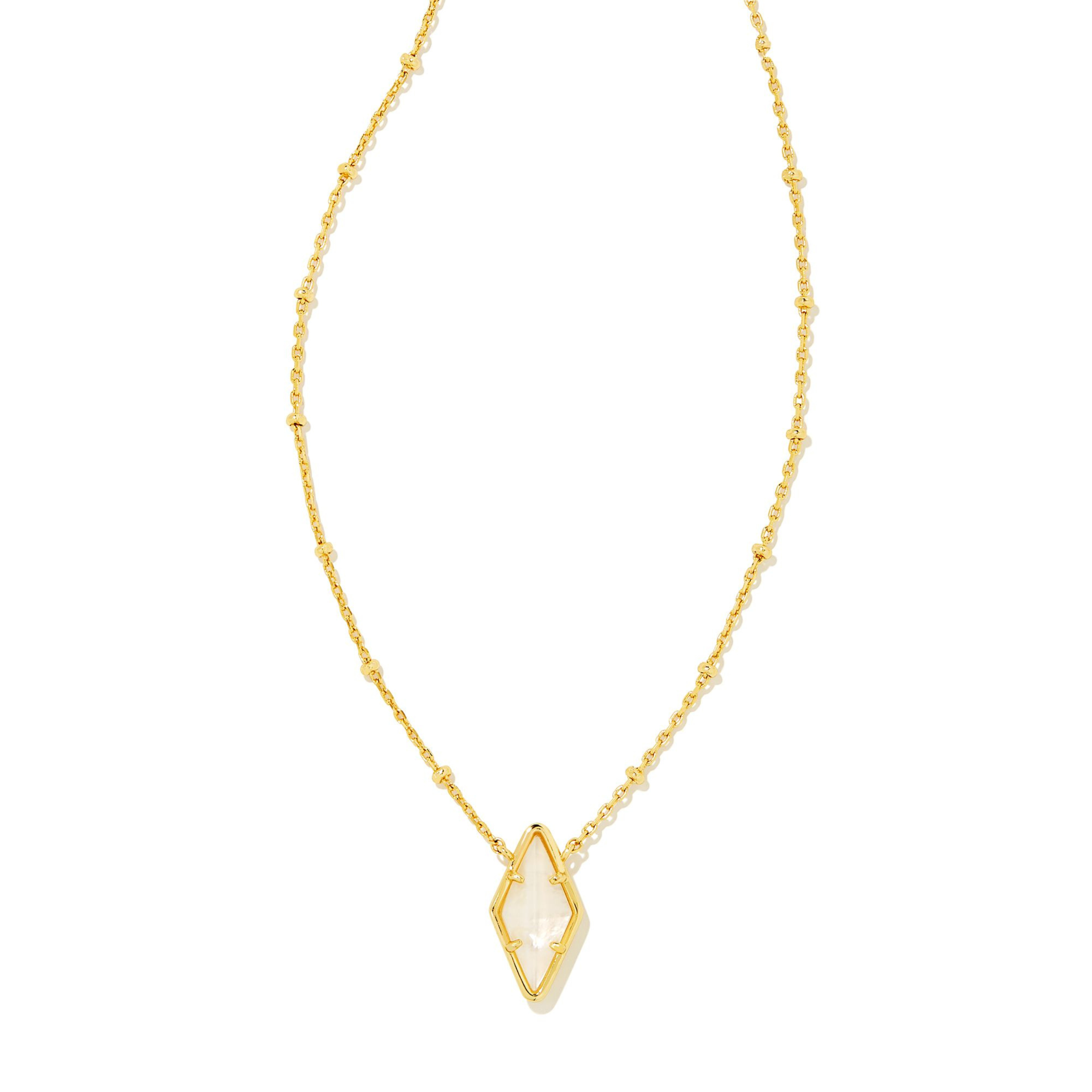 Gold necklace with diamond shaped pendant in ivory mother of pearl pictured on a white background.