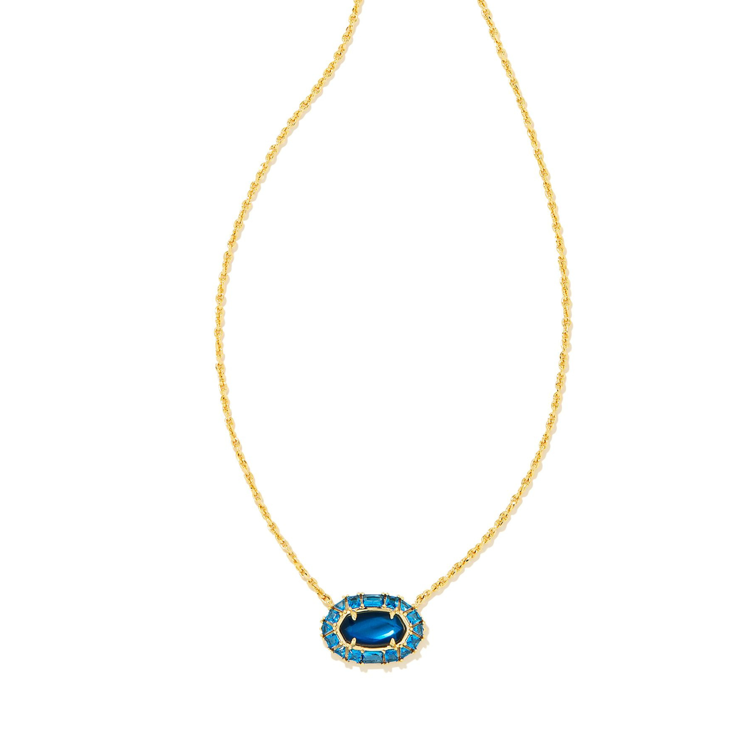 Gold chain necklace with a crystal and sea blue illusion oval pendant pictured on a white background. 
