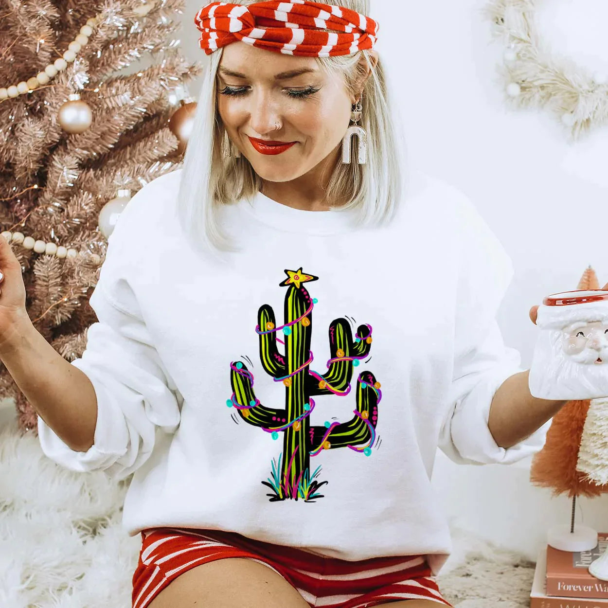 Online Exclusive | Holiday Cactus With Lights Long Sleeve Graphic Fleece Sweatshirt in White - Giddy Up Glamour Boutique