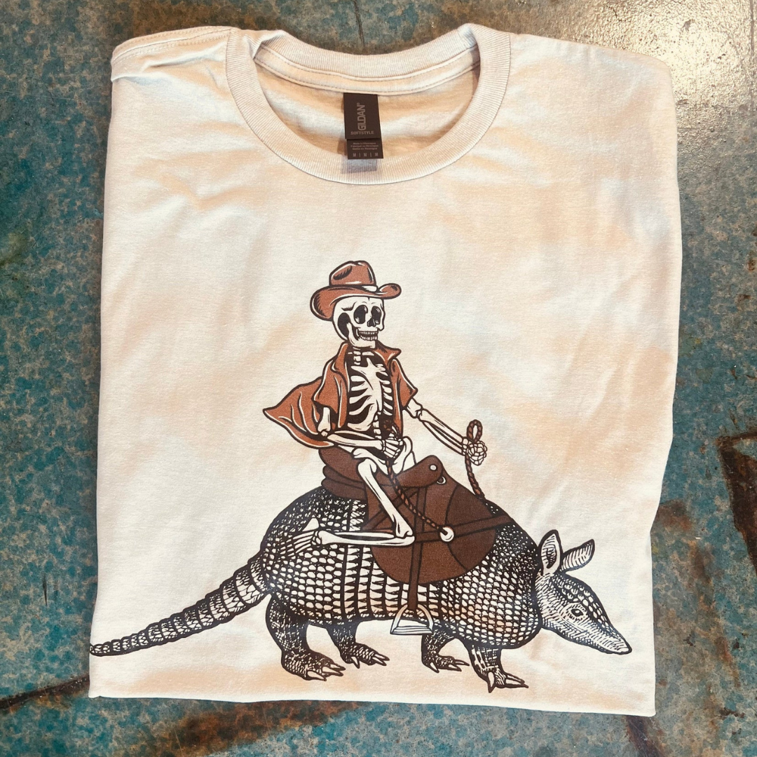 Online Exclusive | Skeleton on Armadillo Short Sleeve Graphic Tee in Cream - Giddy Up Glamour Boutique