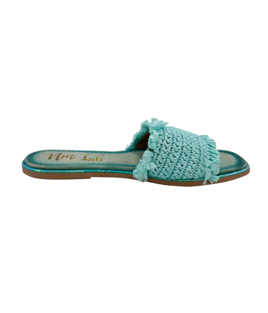 Turquoise woven sandal on a white background