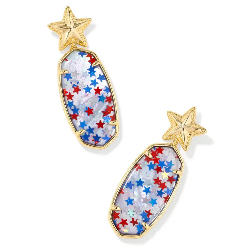 A solid white background. In front kendra scott earrings with a gold star post and drop filled with Red White Blue Star Illusion. 