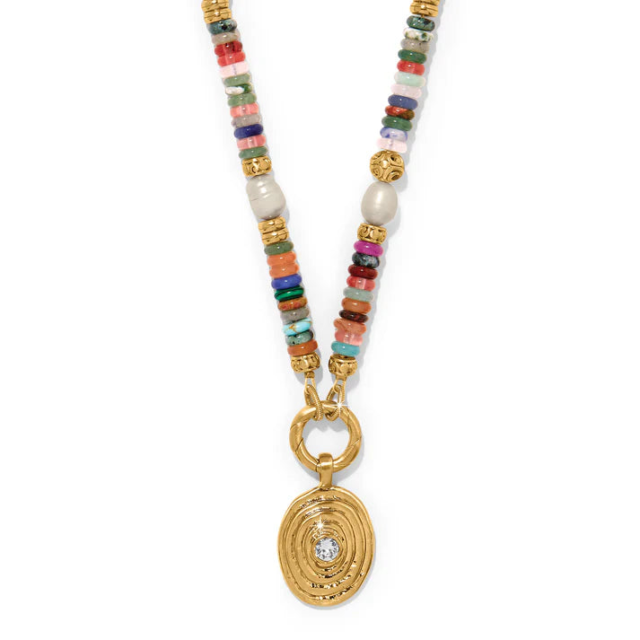 Multicolor token necklace on a white background.