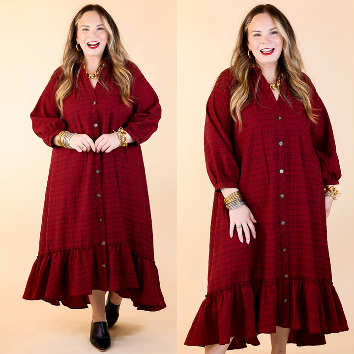 A model wearing a maroon plaid button-up midi dress with a ruffle hemline and long sleeves, paired with black mules.