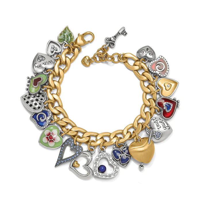 Gold chain bracelet with various heart-shaped charms on a white background
