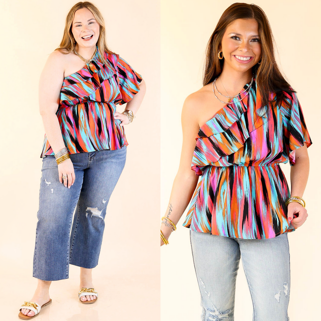 This adorable top has a one shoulder upper with ruffle detail, and elastic waist, and a striped pattern. Available in sizes small through plus size.