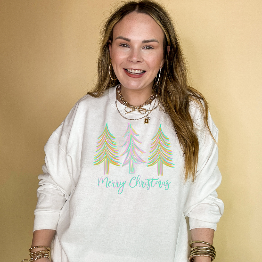 Online Exclusive | Merry Christmas Pastel Christmas Tree Graphic Sweatshirt in Multiple Color Options