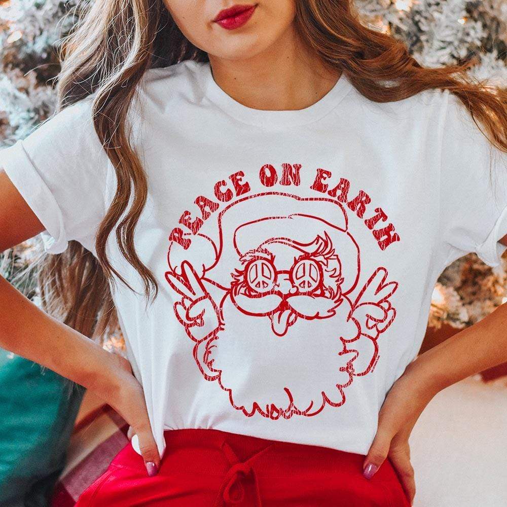 Online Exclusive | Peace on Earth Santa Christmas Graphic Tee in White - Giddy Up Glamour Boutique